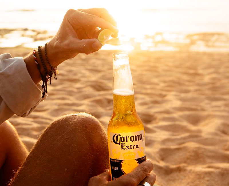 How to drink corona beer, with a lemon slice.