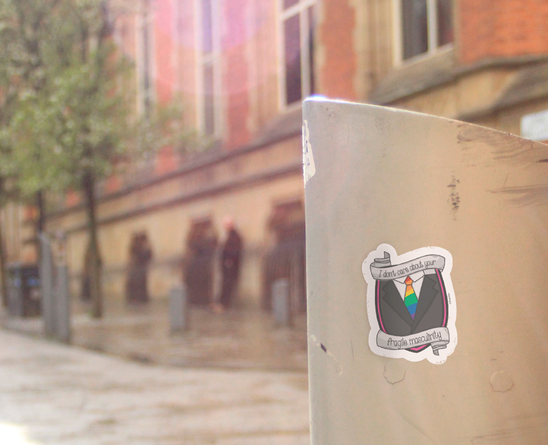I Don't Care About Your Fragile Masculinity Sticker Etsy Shop. Black suit with gay tie crest.
