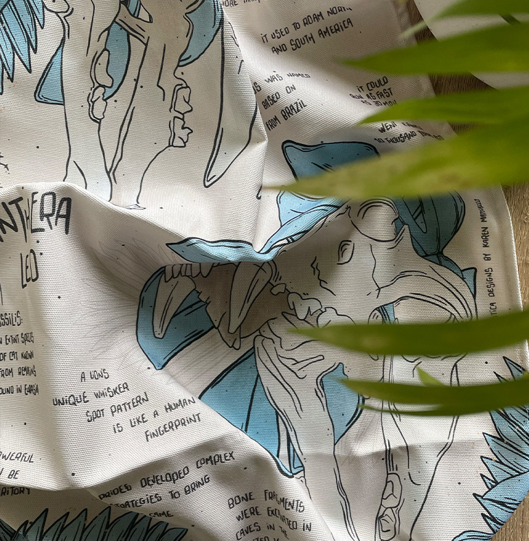 York Museums Trust Souvenir shop supplier, printed textiles, gifts for cultural institutions, wholesale orders. saber tooth, smilodon and monsteras, ice age, fossils, dinosaur merch.